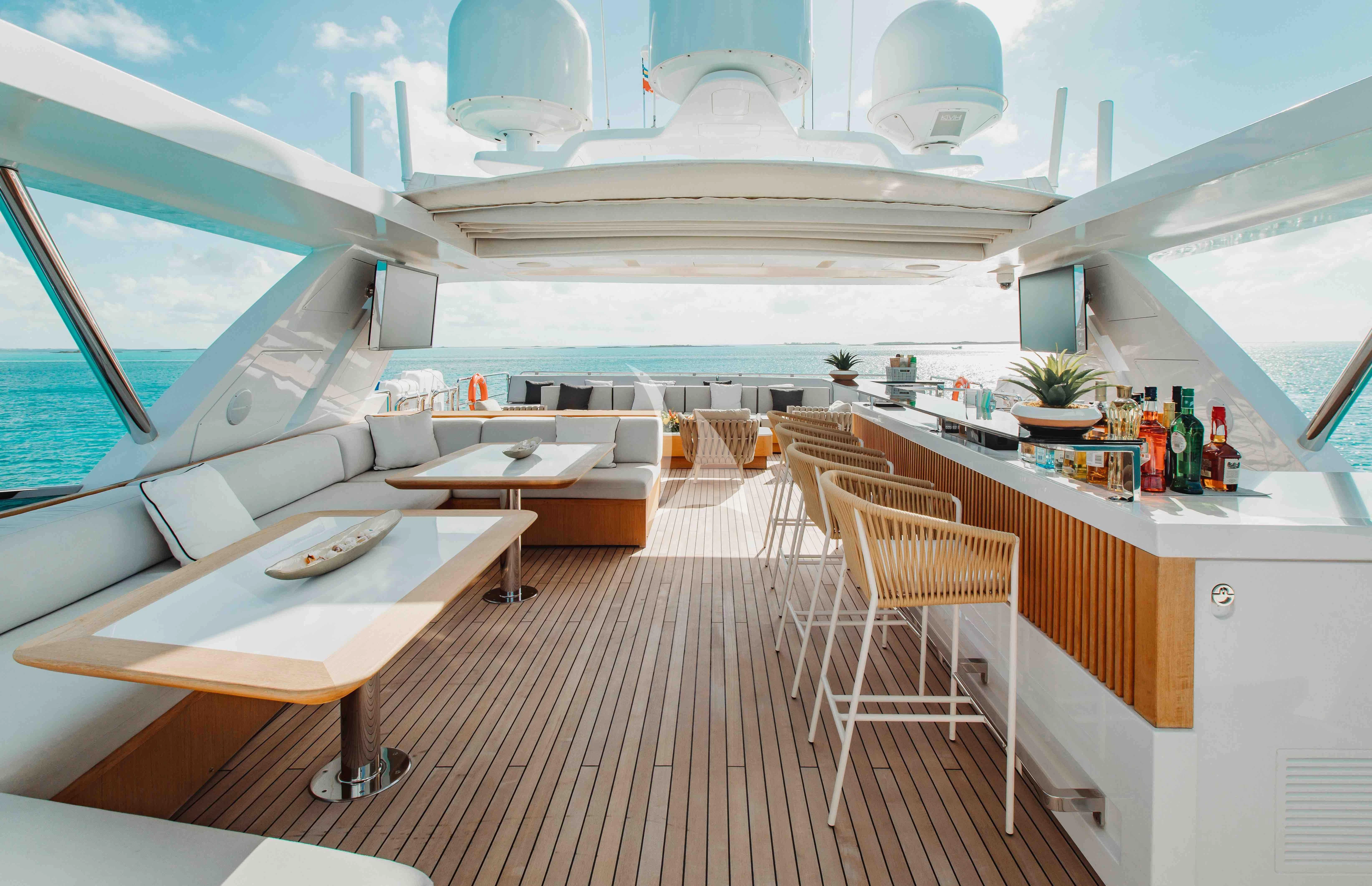 a room with a table and chairs aboard EMINA Yacht for Charter