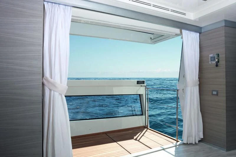 a large blue swimming pool aboard EMINA Yacht for Charter