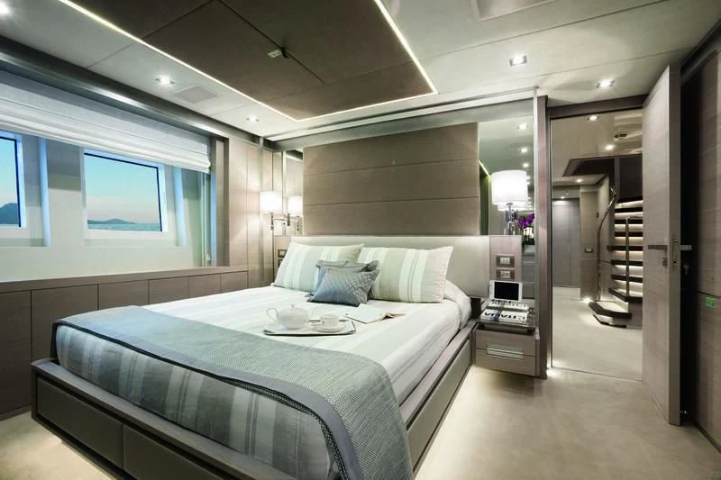 a bed in a room aboard EMINA Yacht for Charter