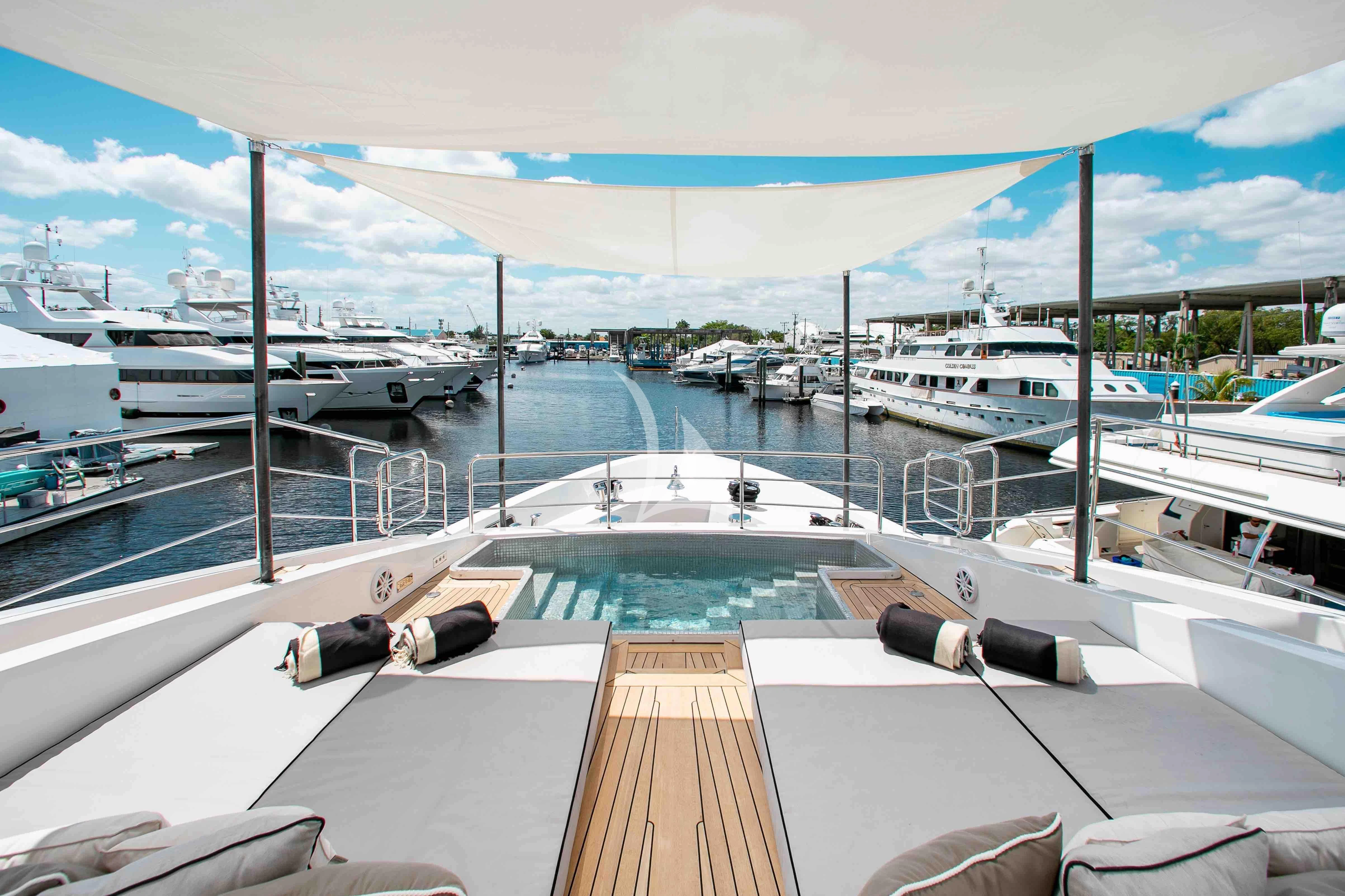 a deck with many boats aboard EMINA Yacht for Charter