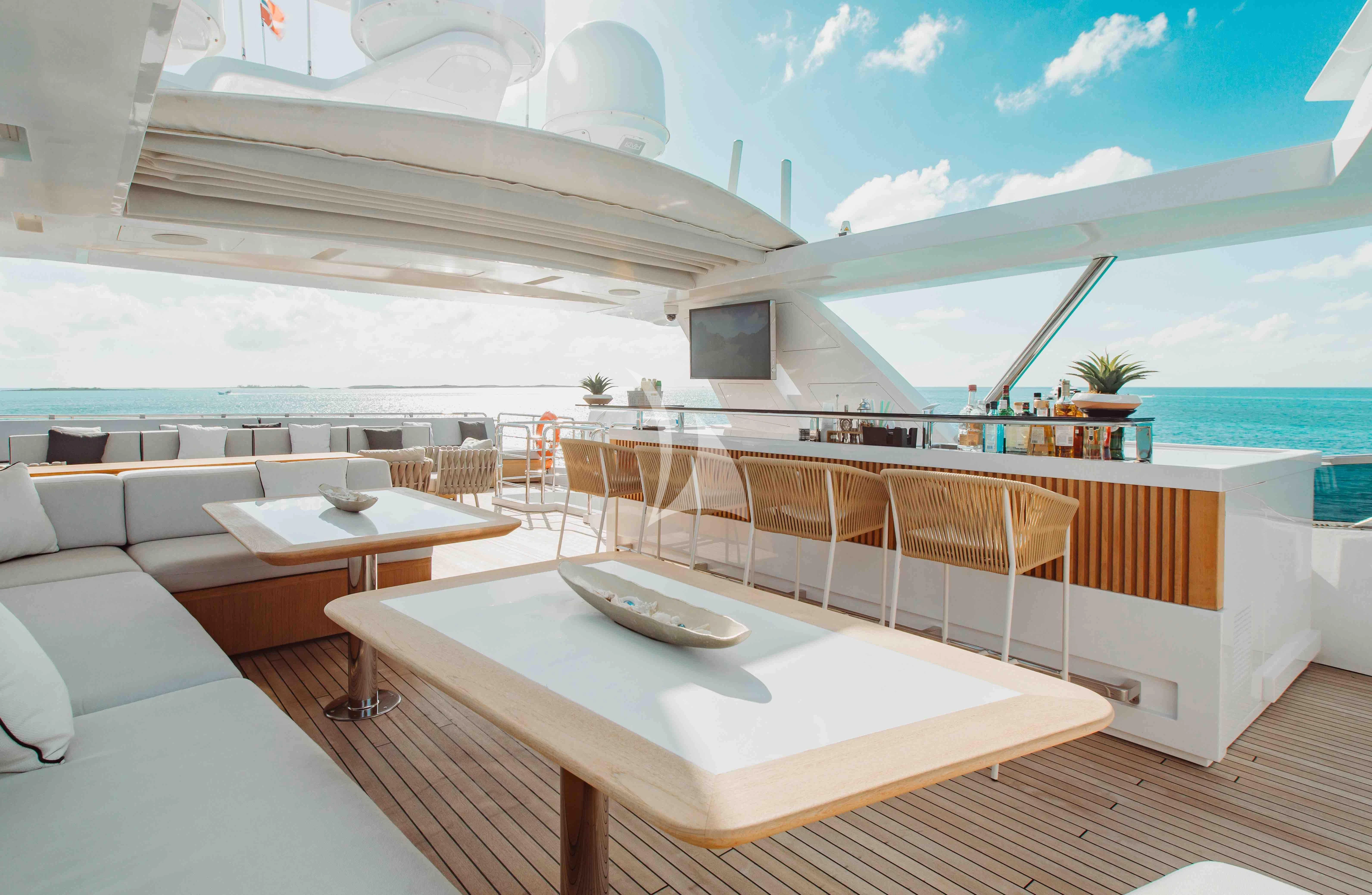 a room with a table and chairs aboard EMINA Yacht for Charter