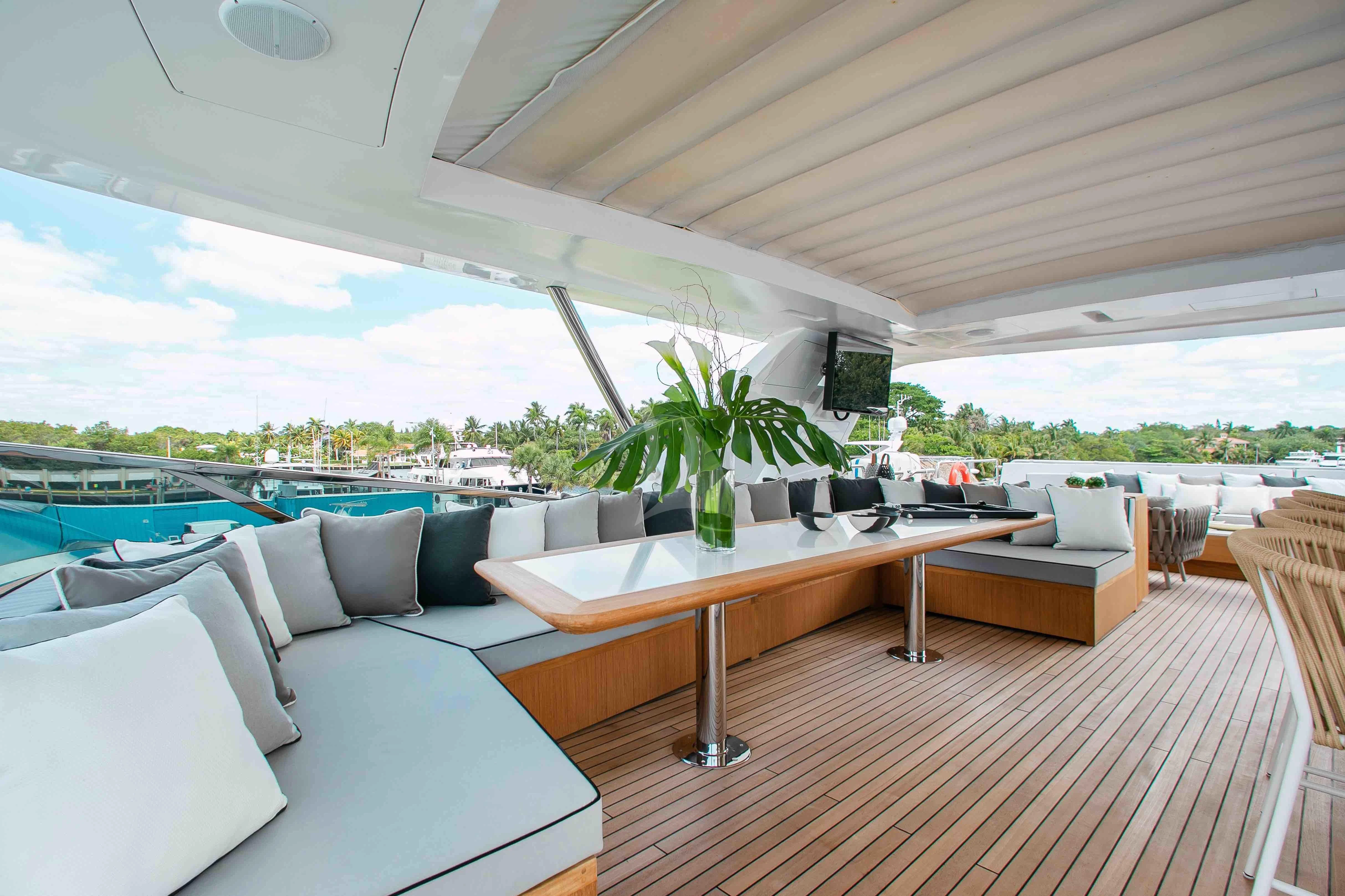 a room with a table and chairs aboard EMINA Yacht for Charter