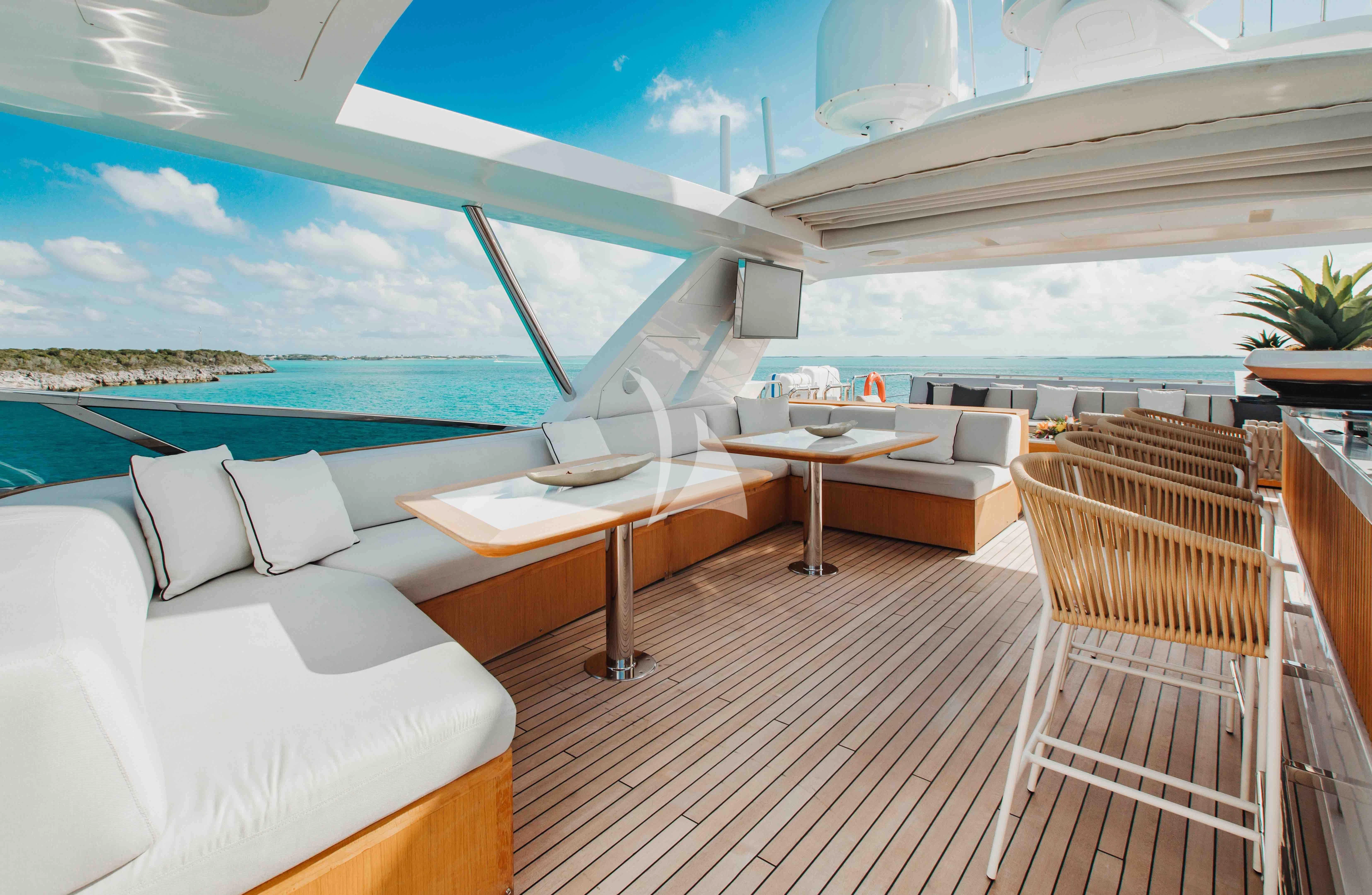a room with a table and chairs aboard EMINA Yacht for Charter