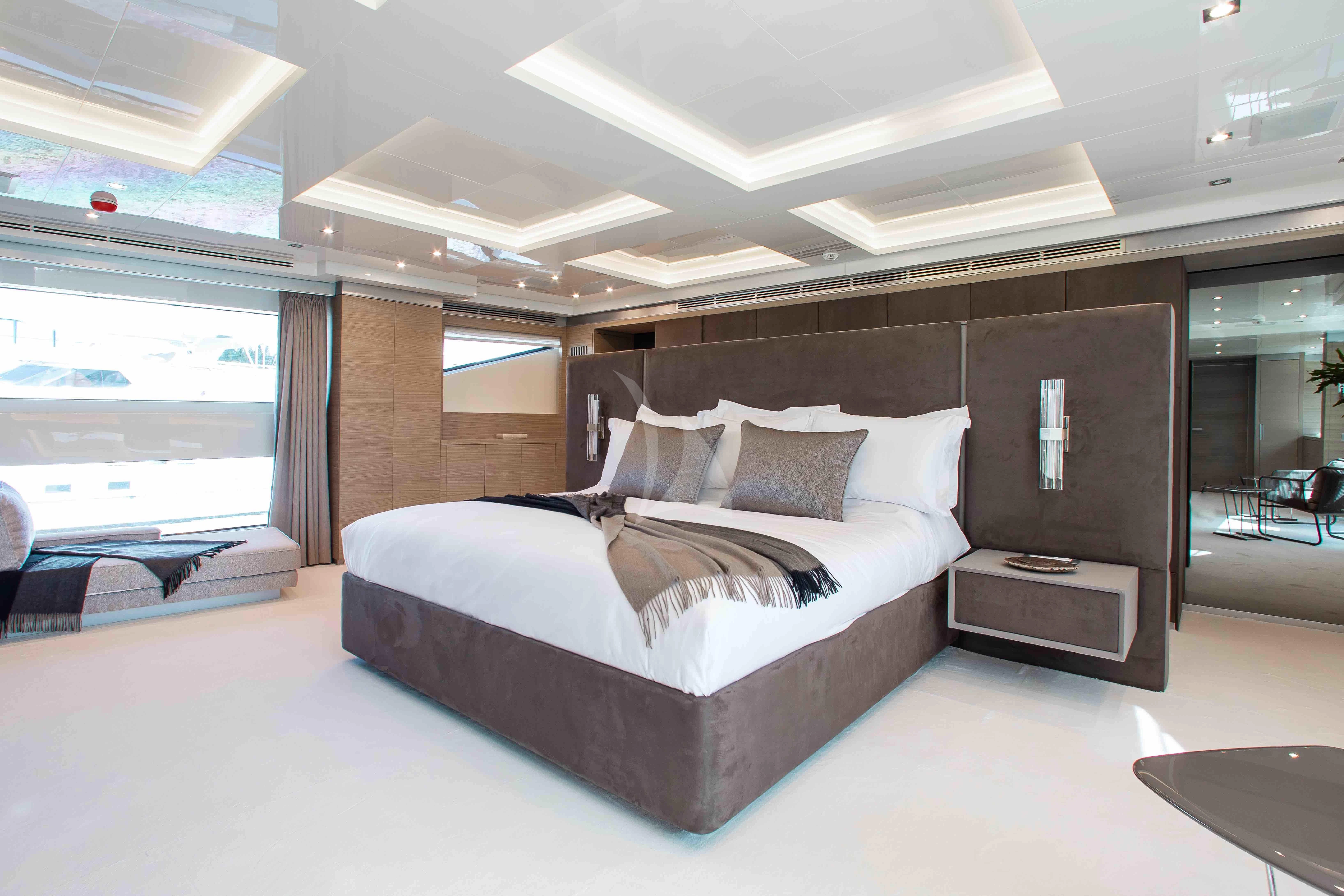 a bed in a room aboard EMINA Yacht for Charter