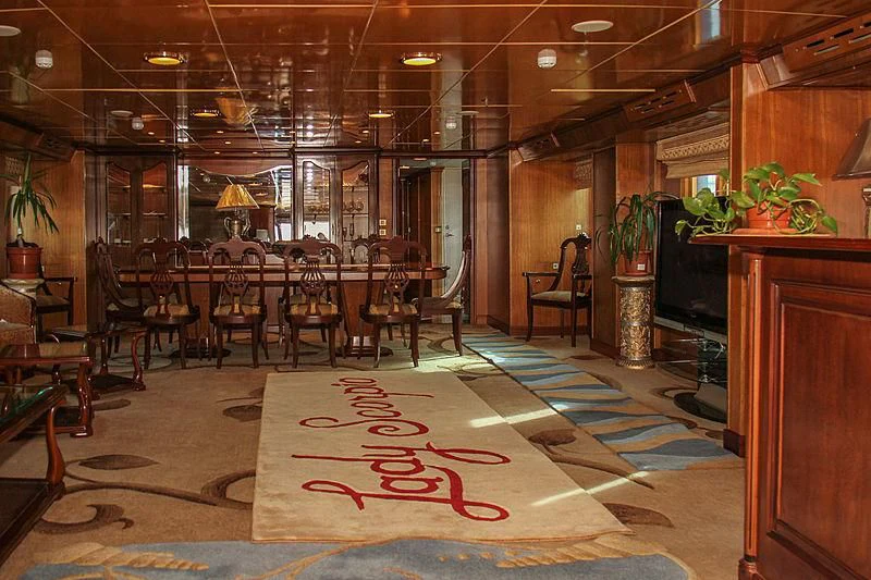 a room with chairs and tables aboard PRINCESS OF PALAU Yacht for Sale