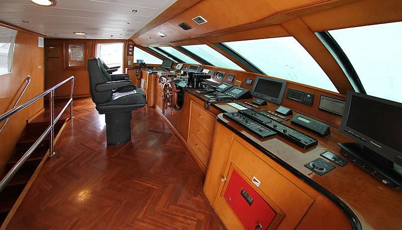 a room with a desk and a chair aboard PRINCESS OF PALAU Yacht for Sale