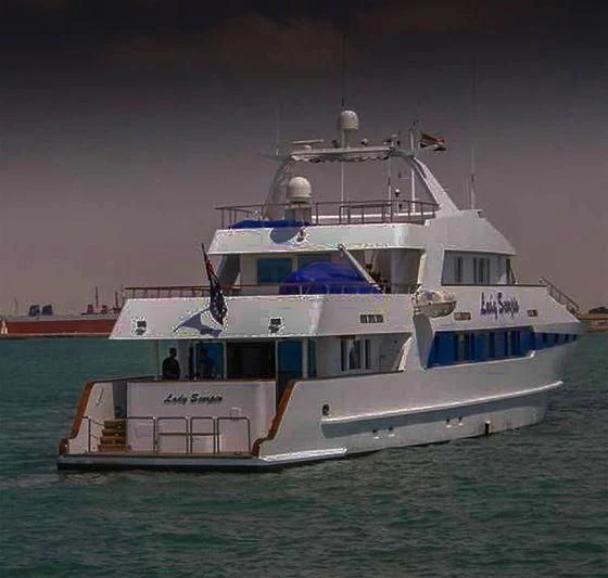 a large white boat in the water aboard PRINCESS OF PALAU Yacht for Sale