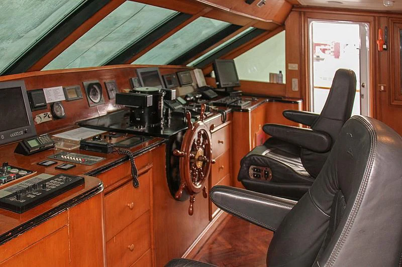 a leather chair in a room aboard PRINCESS OF PALAU Yacht for Sale