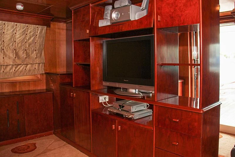a tv on a cabinet aboard PRINCESS OF PALAU Yacht for Sale