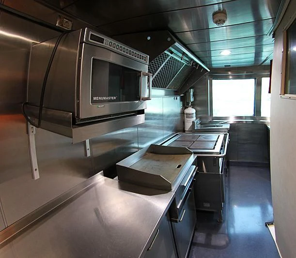 a kitchen with a large oven aboard PRINCESS OF PALAU Yacht for Sale