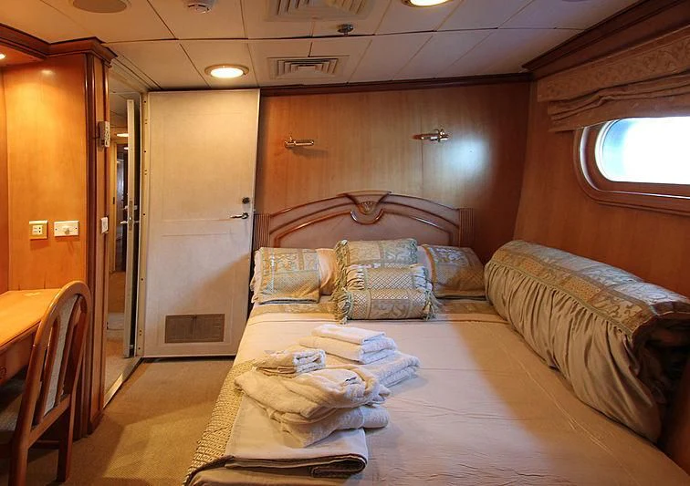a room with two beds aboard PRINCESS OF PALAU Yacht for Sale