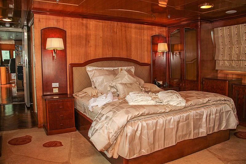 a bed in a room aboard PRINCESS OF PALAU Yacht for Sale