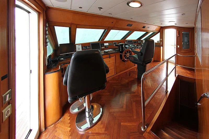 a chair in a room aboard PRINCESS OF PALAU Yacht for Sale