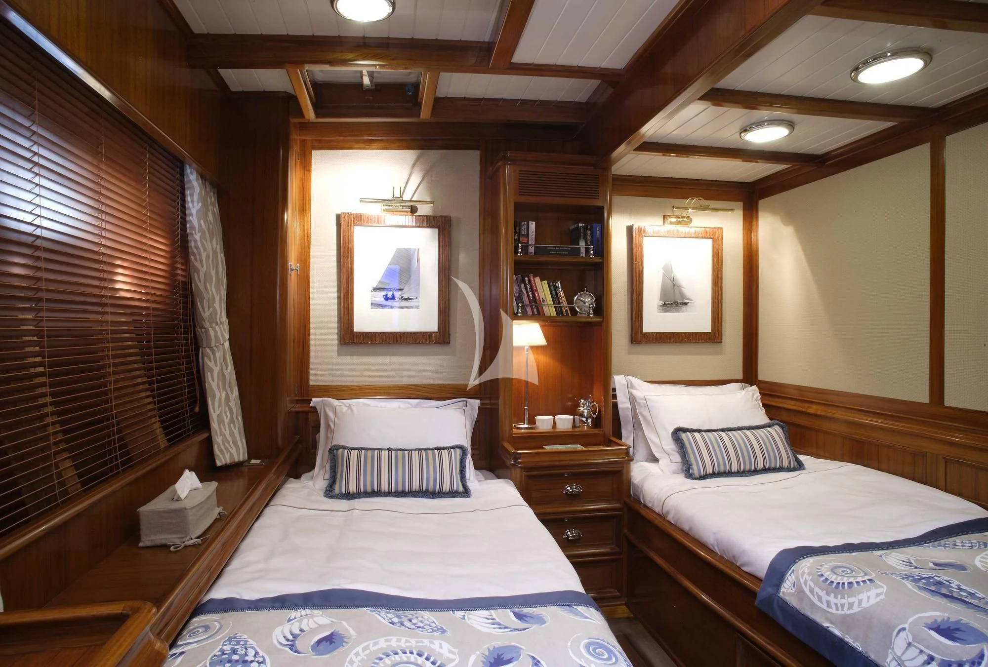 a room with two beds aboard EUGENIA VII Yacht for Sale