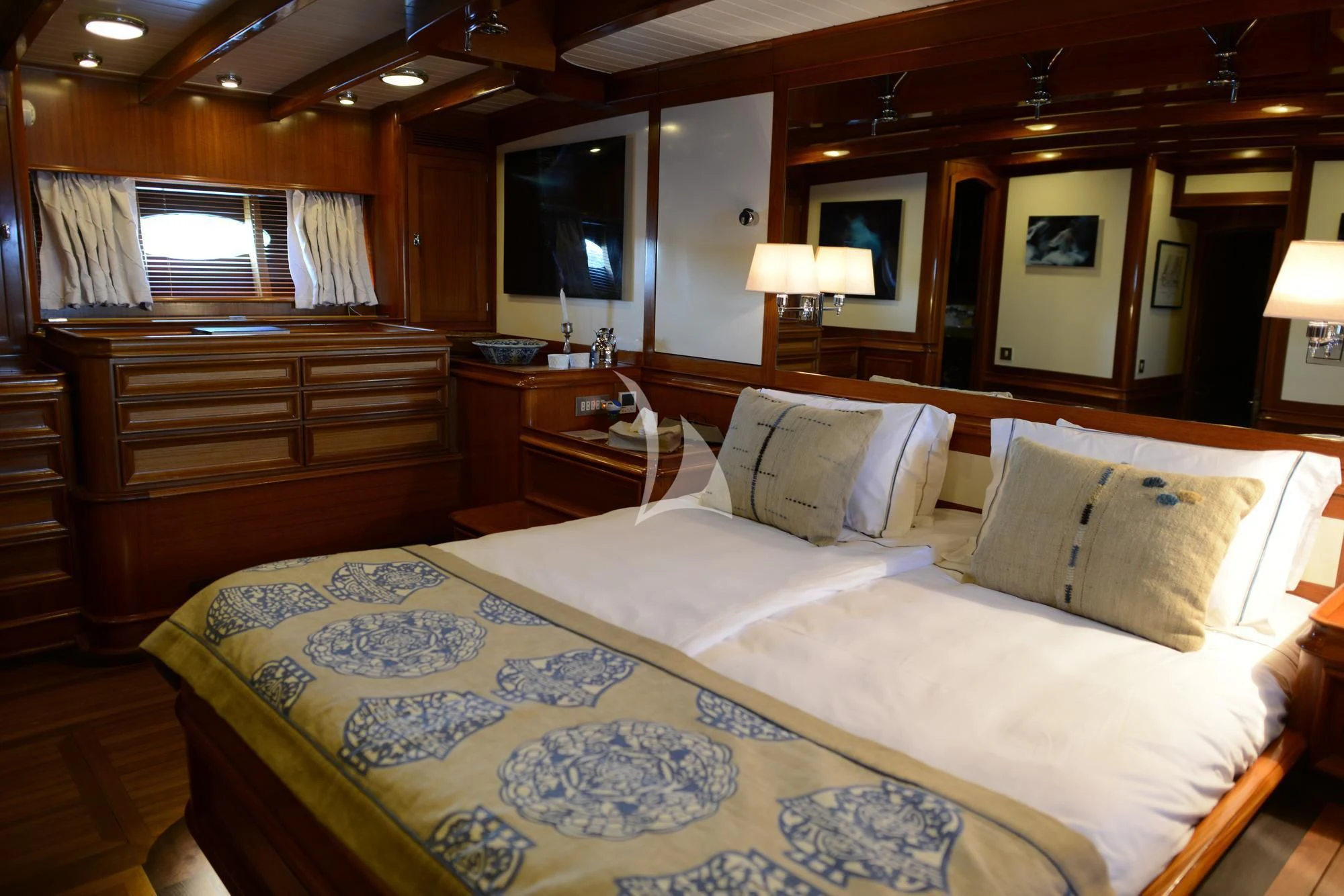 a bed in a room aboard EUGENIA VII Yacht for Sale