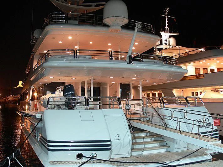 a large cruise ship docked aboard AO Yacht for Sale