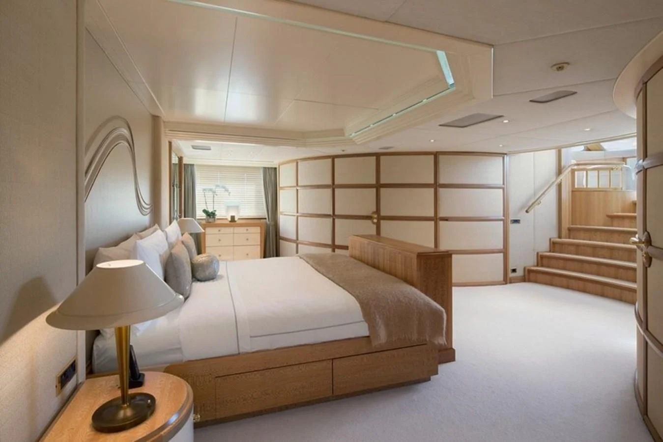 a bed in a room aboard AO Yacht for Sale