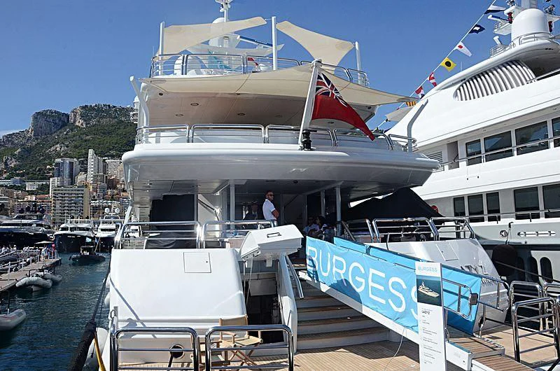 a boat docked at a pier aboard AO Yacht for Sale