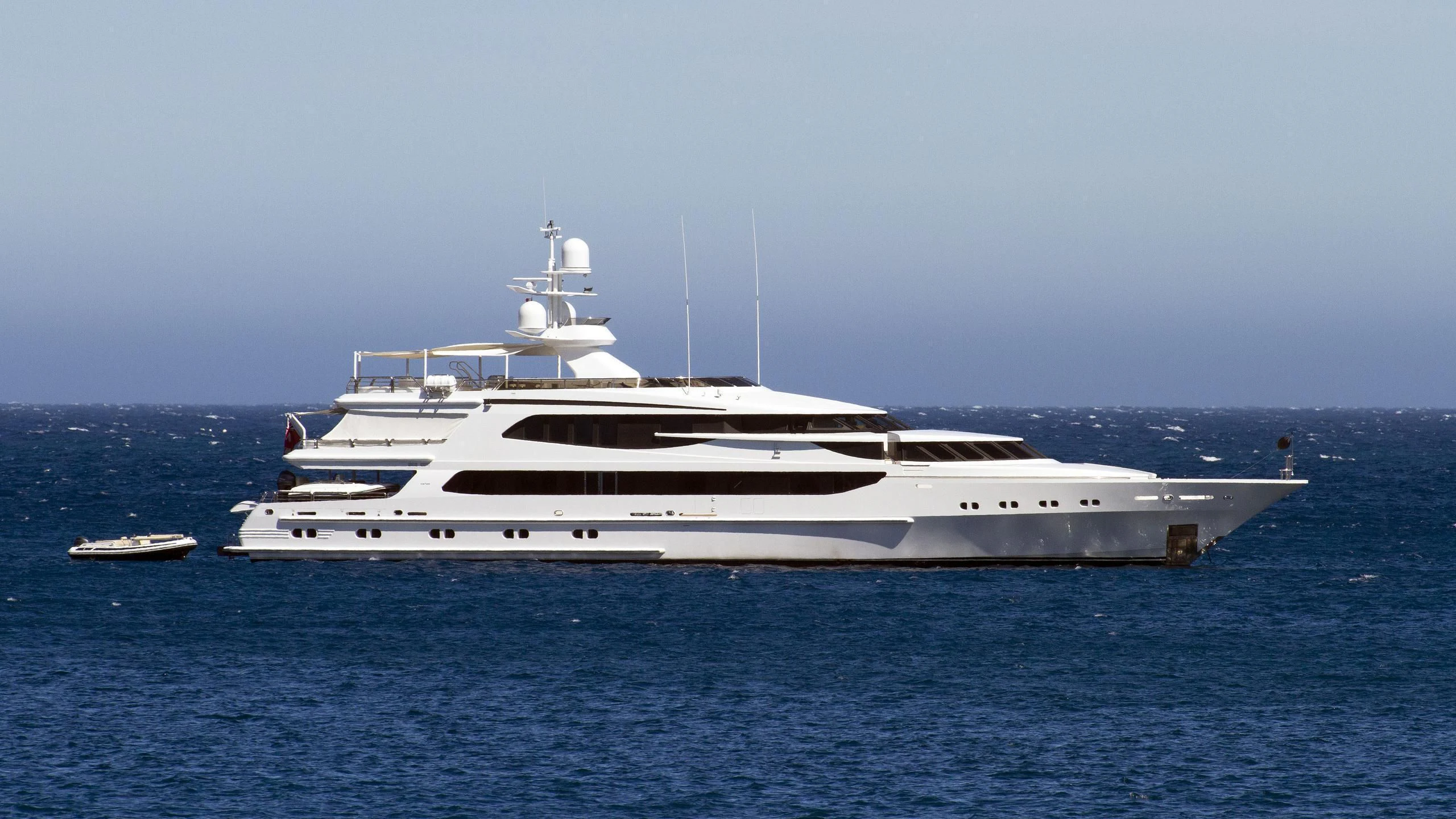 a white yacht in the water aboard AO Yacht for Sale