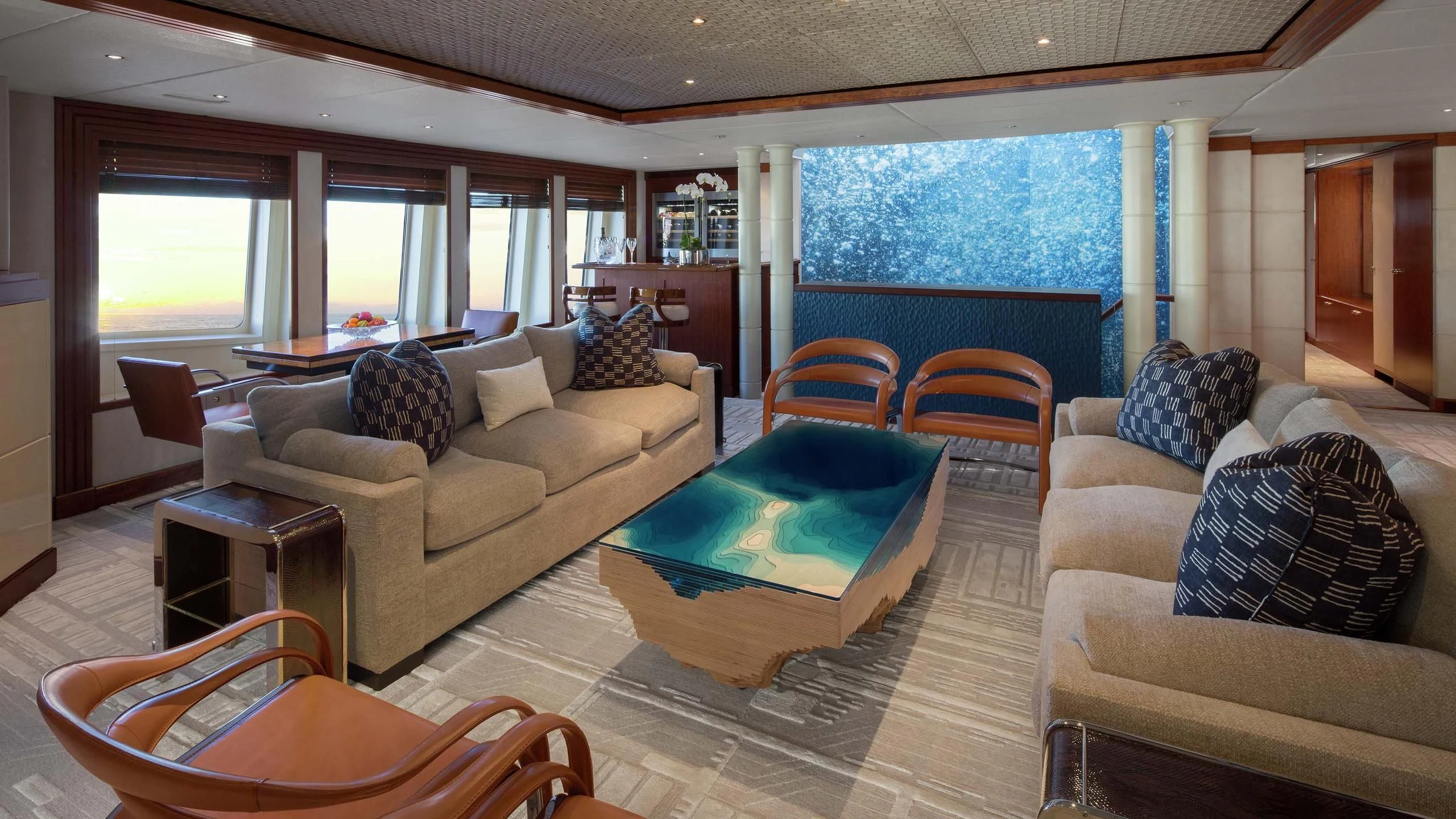 a living room with a large window aboard AO Yacht for Sale