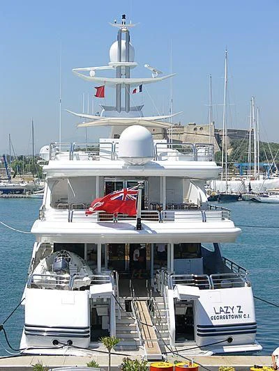 a boat docked at a port aboard AO Yacht for Sale