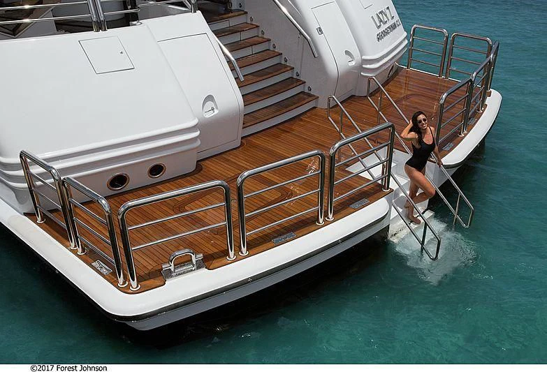 a person standing on a boat aboard AO Yacht for Sale