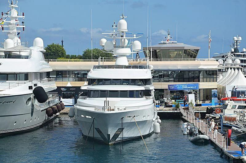 several boats docked at a pier aboard AO Yacht for Sale
