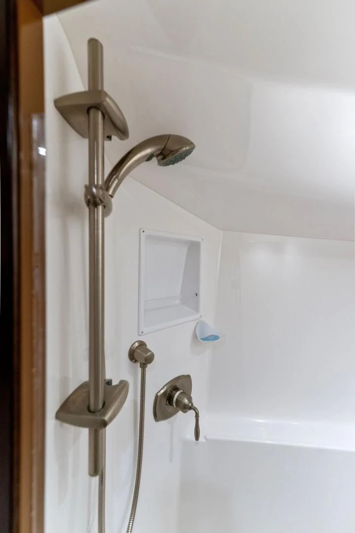a bathroom with a light fixture aboard THE PROVIDER Yacht for Sale