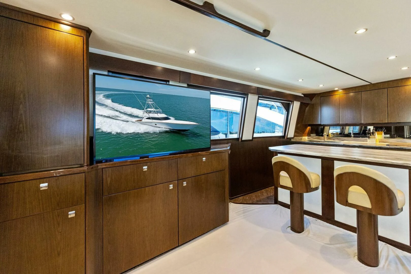 a room with a table and chairs aboard THE PROVIDER Yacht for Sale