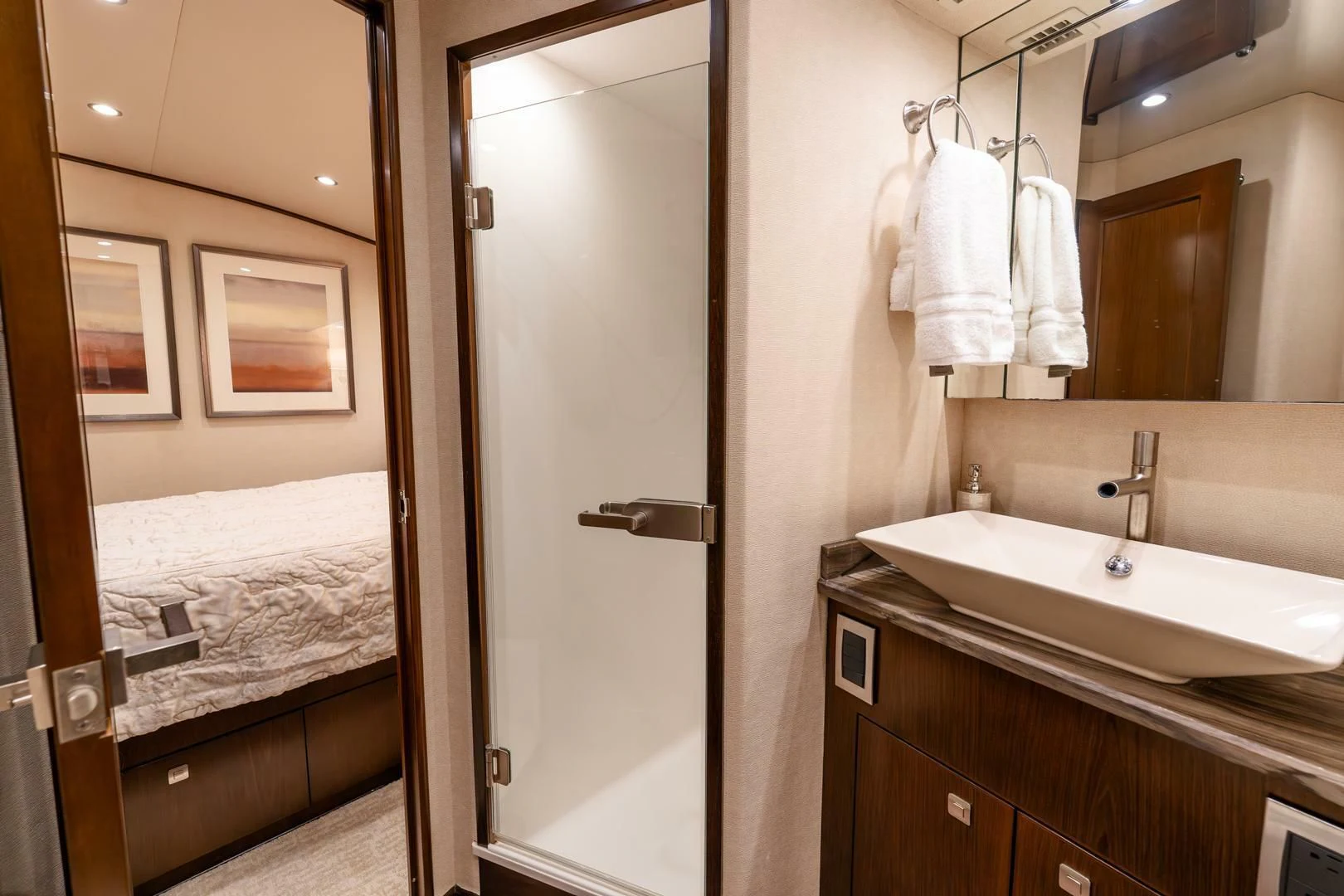 a bathroom with a sink and a mirror aboard THE PROVIDER Yacht for Sale