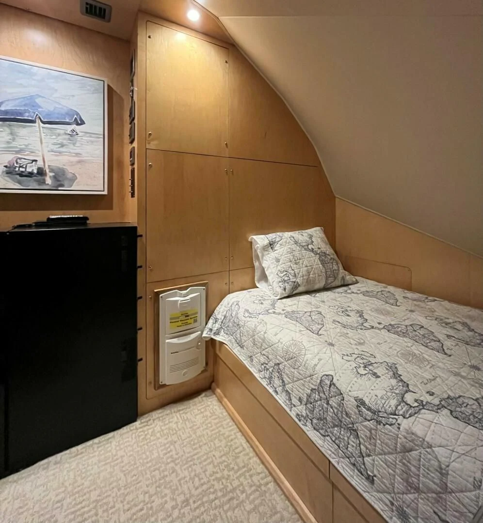 a bed in a room aboard THE PROVIDER Yacht for Sale