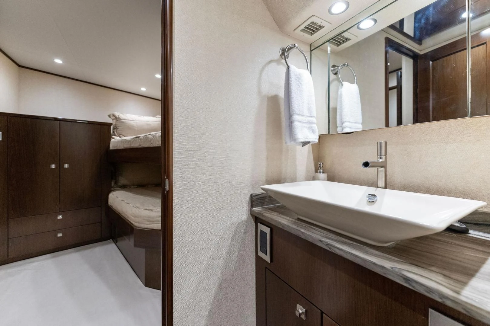 a bathroom with a sink and a mirror aboard THE PROVIDER Yacht for Sale