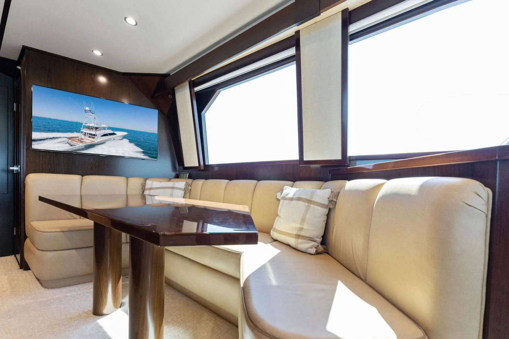 a living room with a couch and a tv aboard THE PROVIDER Yacht for Sale