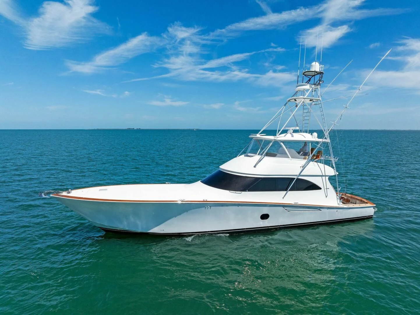 a white boat in the water aboard THE PROVIDER Yacht for Sale
