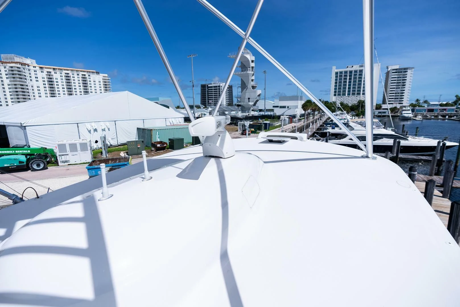 a white boat on a dock aboard THE PROVIDER Yacht for Sale
