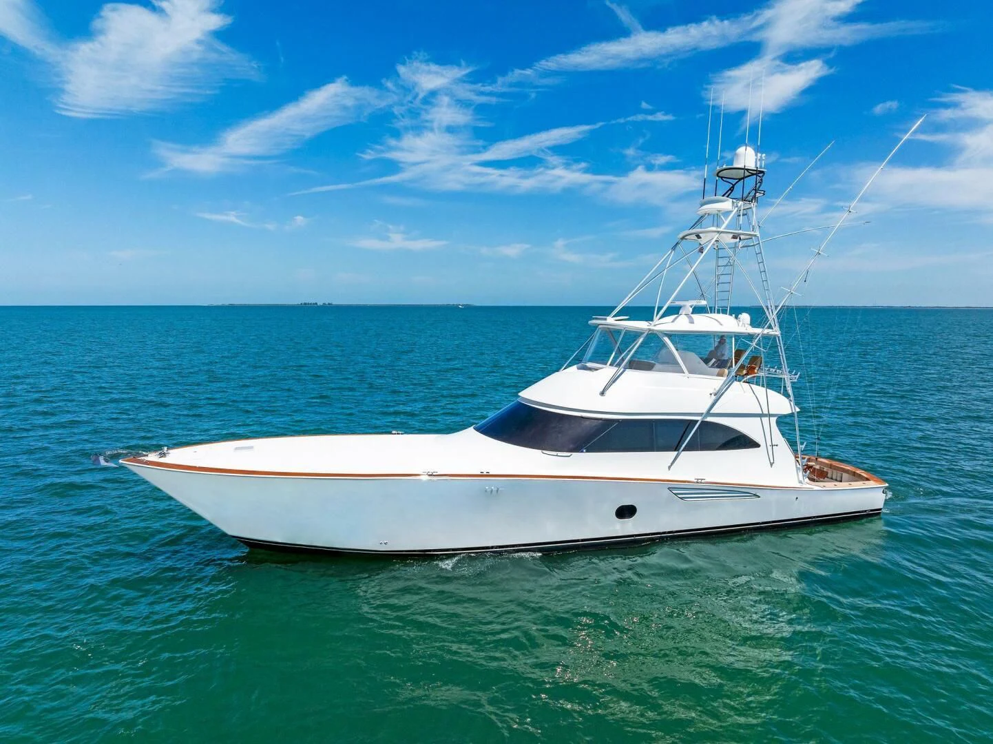 a white boat in the water aboard THE PROVIDER Yacht for Sale