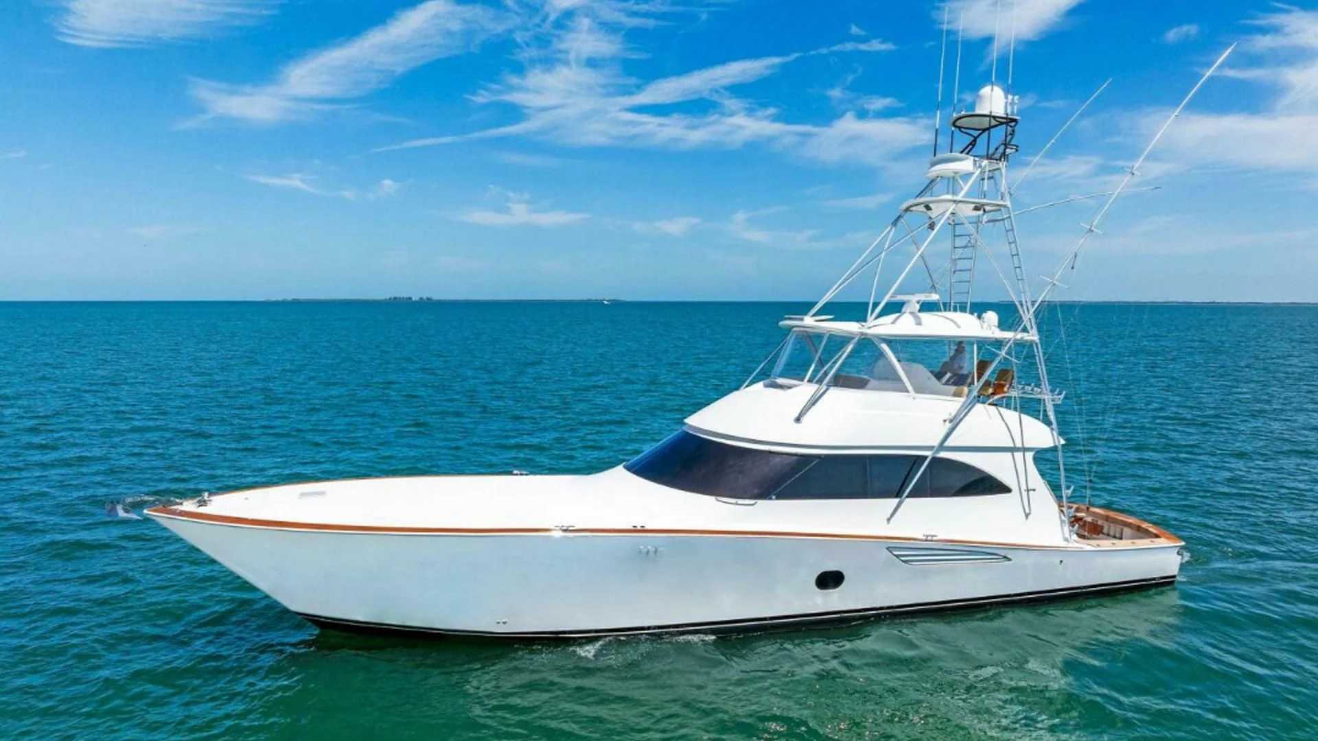 a white boat in the water aboard THE PROVIDER Yacht for Sale