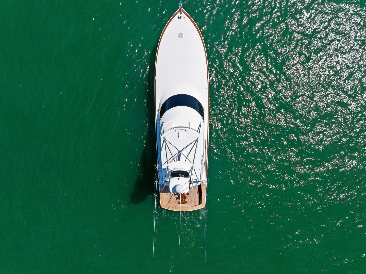 a white boat in the water aboard THE PROVIDER Yacht for Sale
