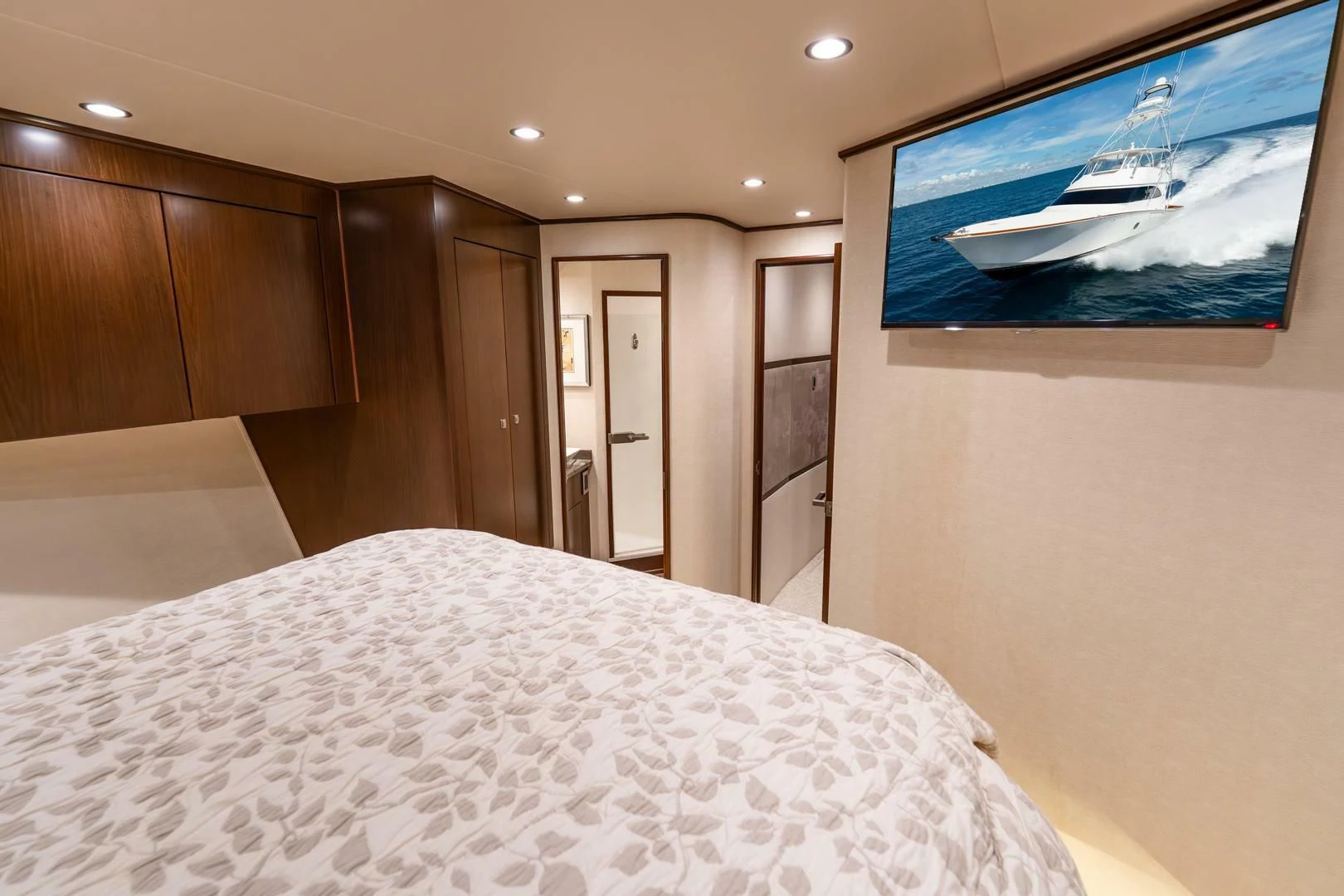 a bedroom with a large bed aboard THE PROVIDER Yacht for Sale