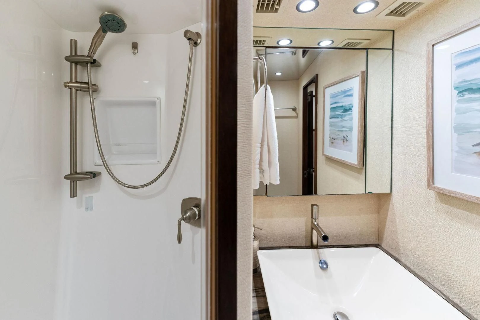 a bathroom with a shower and a sink aboard THE PROVIDER Yacht for Sale