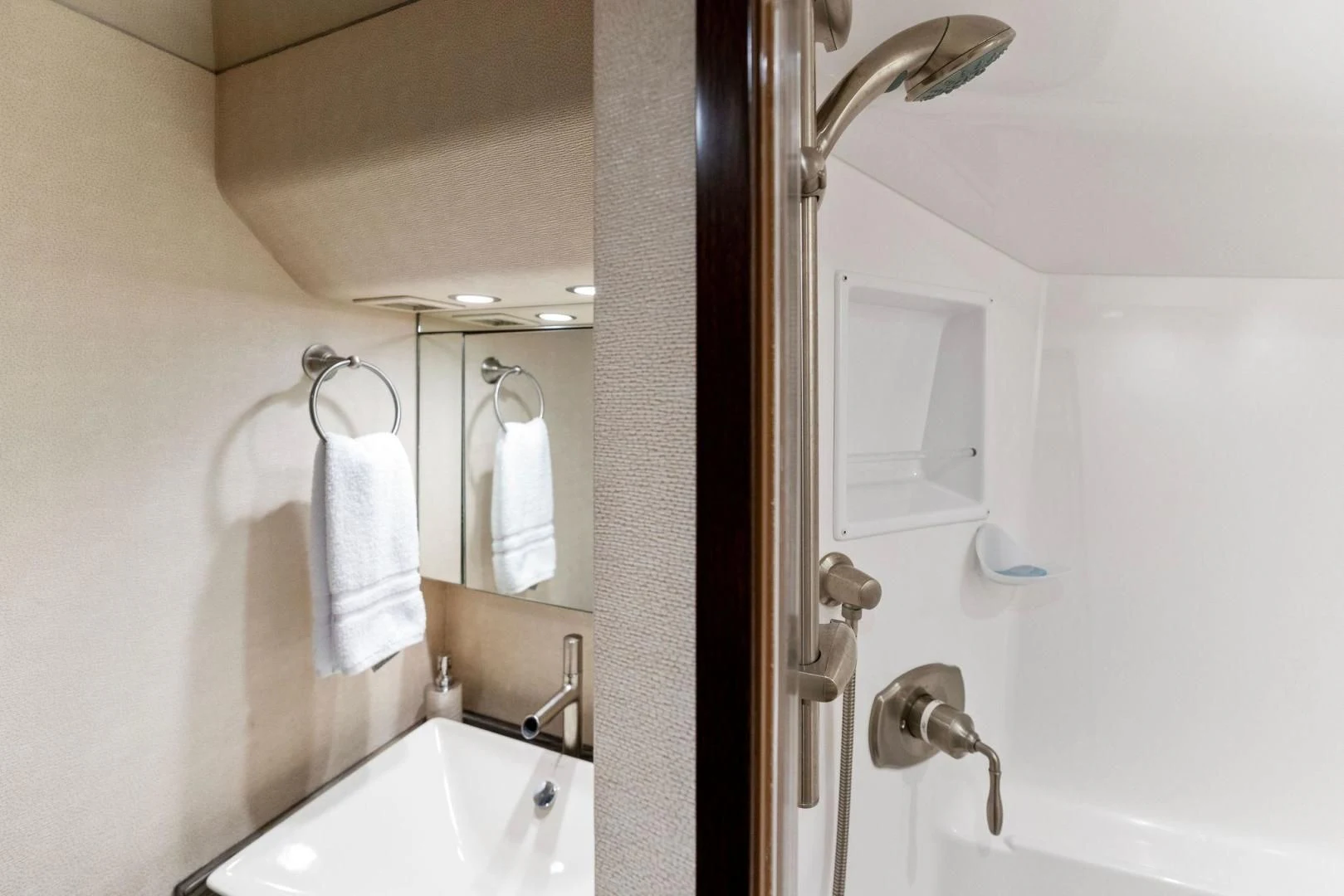 a bathroom with a sink and a mirror aboard THE PROVIDER Yacht for Sale