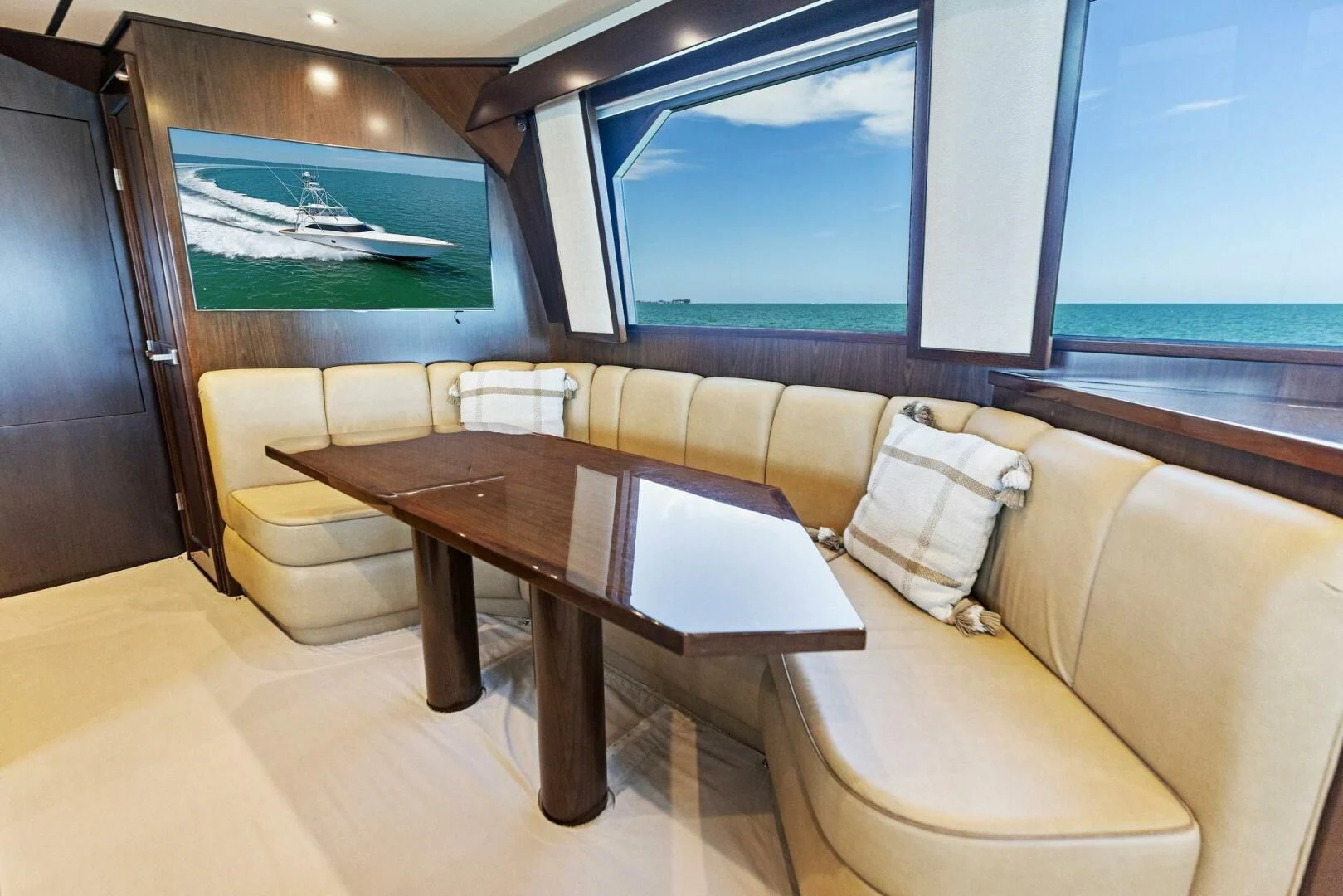 a room with a table and chairs aboard THE PROVIDER Yacht for Sale