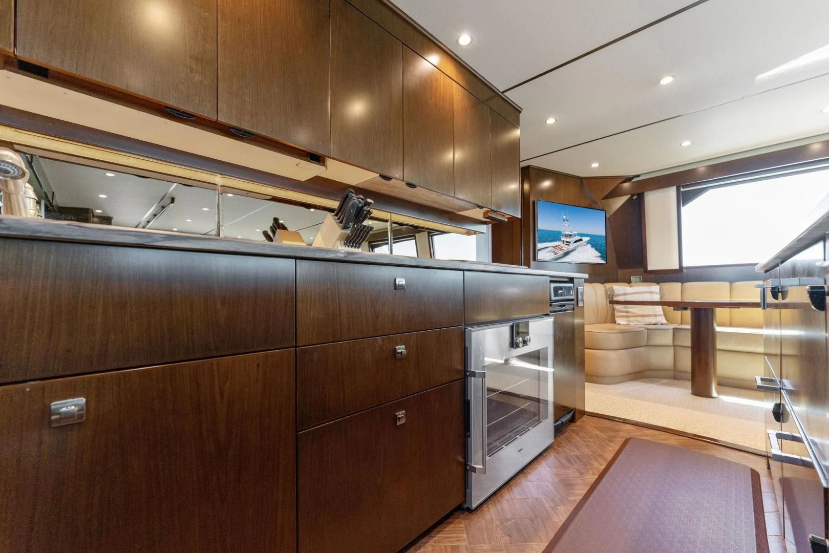 a kitchen with wooden cabinets aboard THE PROVIDER Yacht for Sale