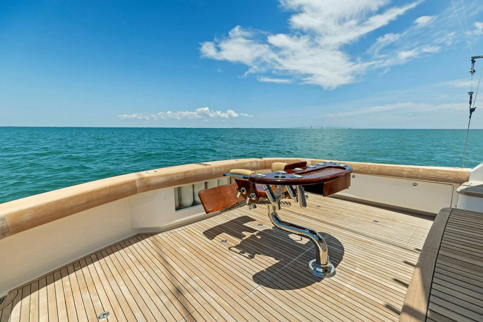 a table on a deck overlooking the ocean aboard THE PROVIDER Yacht for Sale