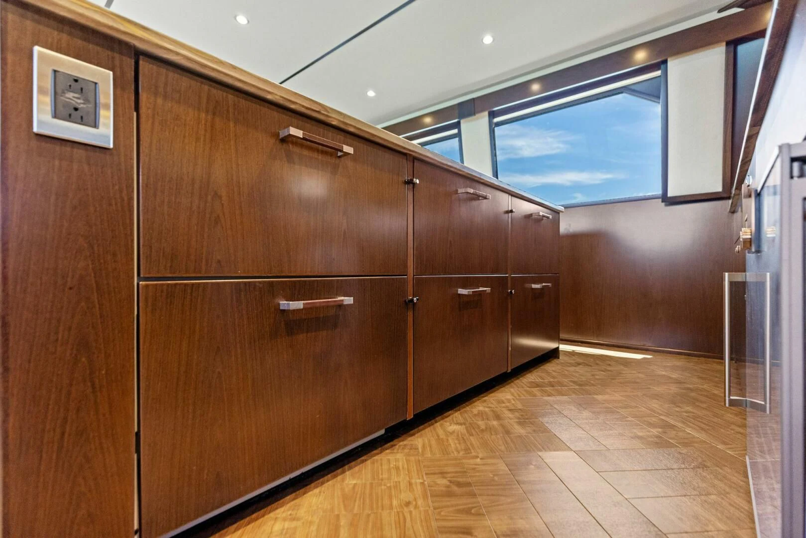 a room with wooden cabinets aboard THE PROVIDER Yacht for Sale
