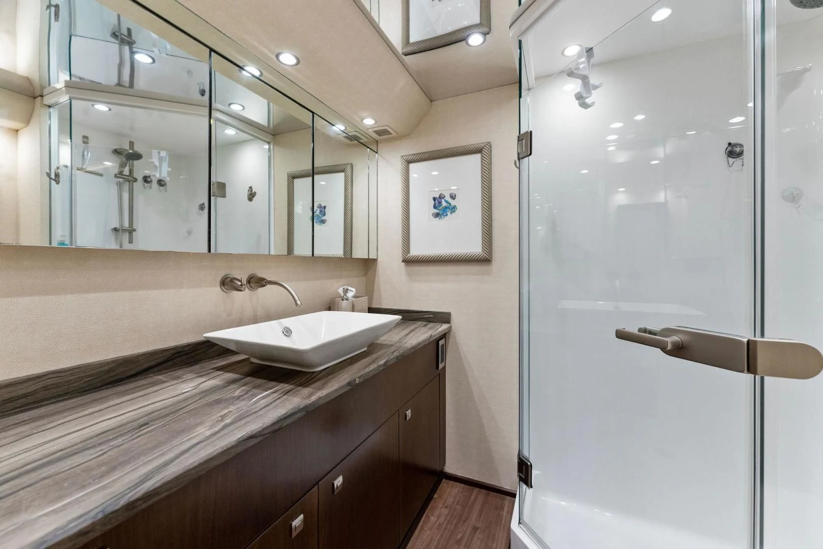 a bathroom with a large mirror aboard THE PROVIDER Yacht for Sale