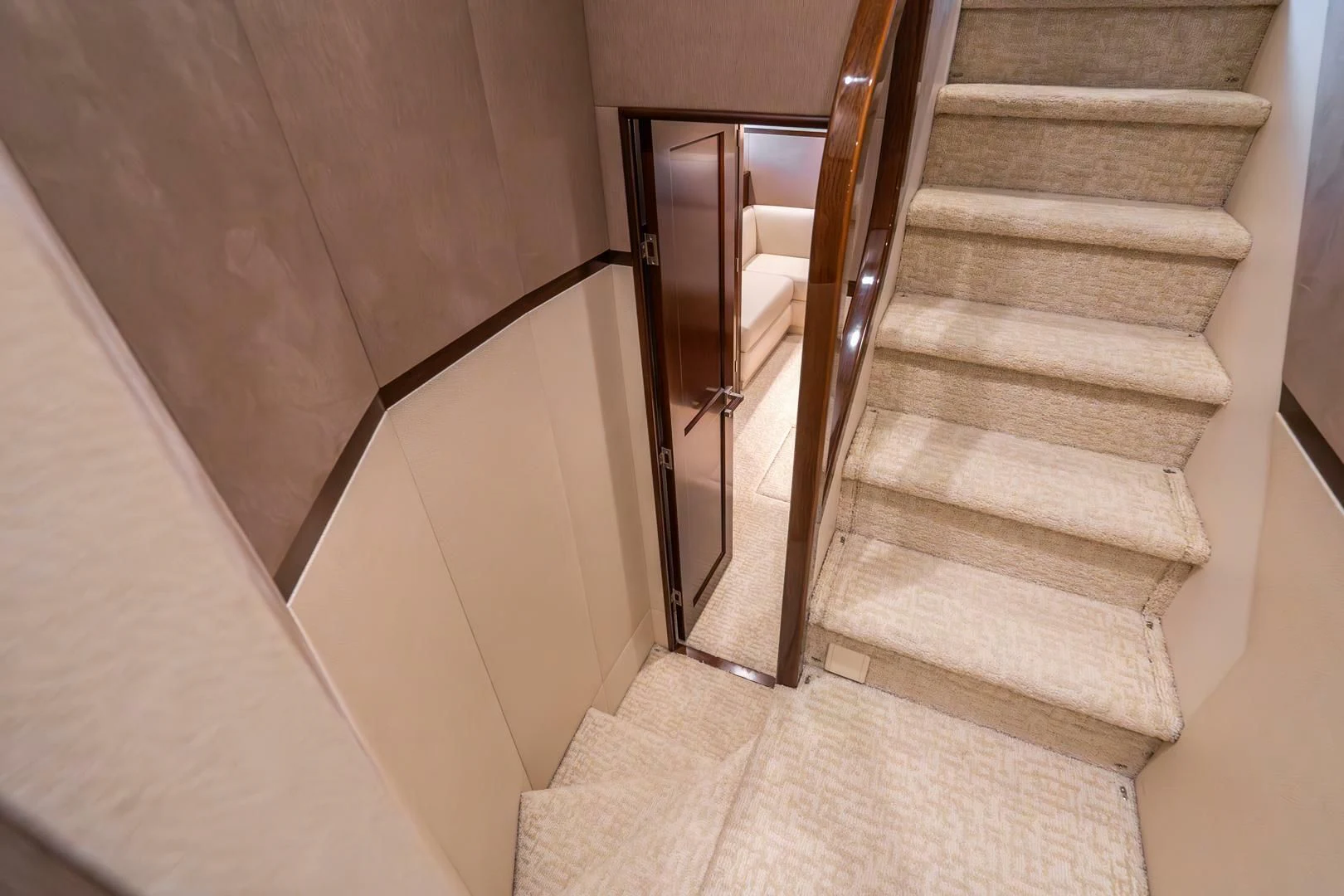a staircase with a door aboard THE PROVIDER Yacht for Sale