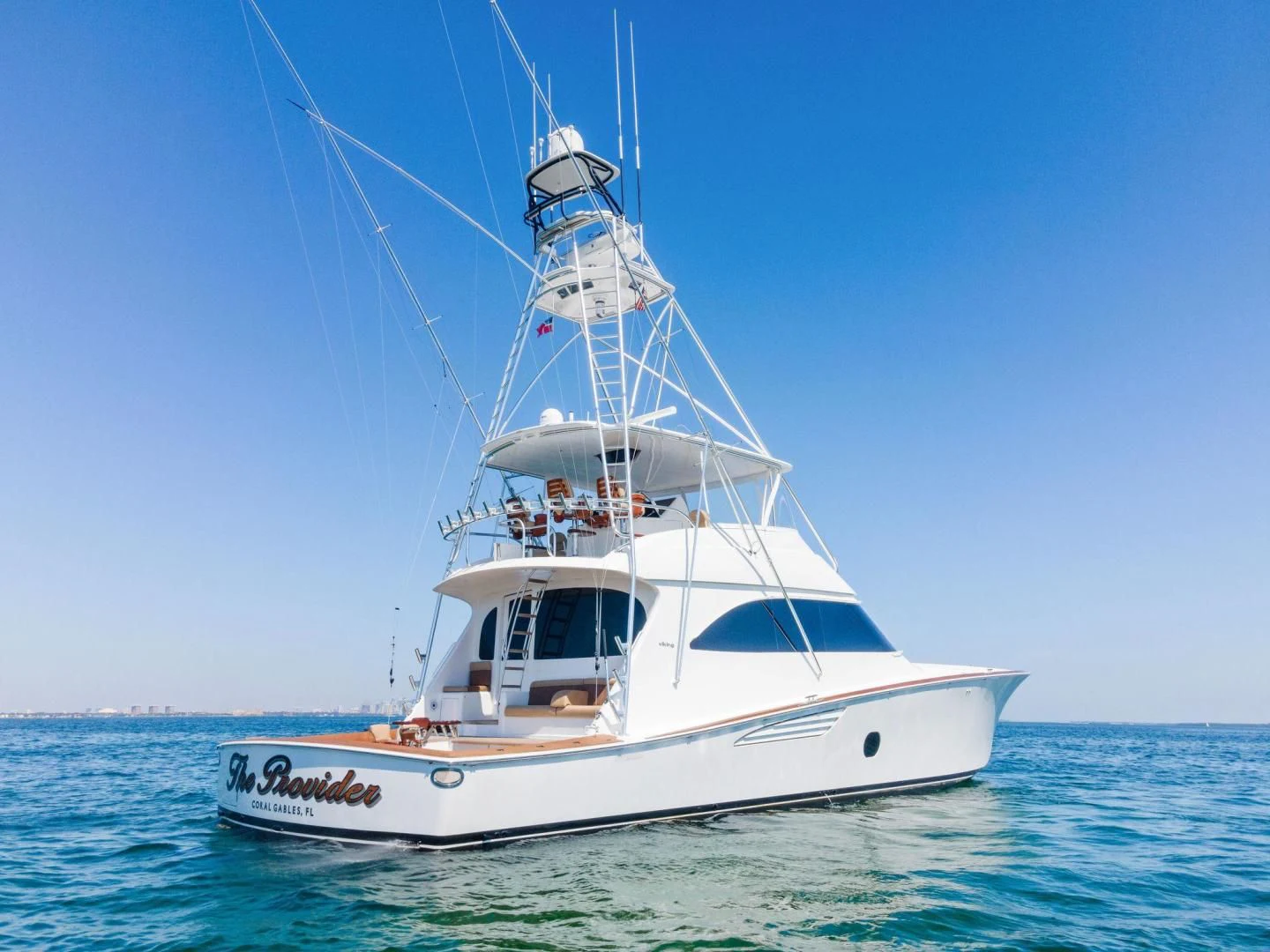 a white boat in the water aboard THE PROVIDER Yacht for Sale