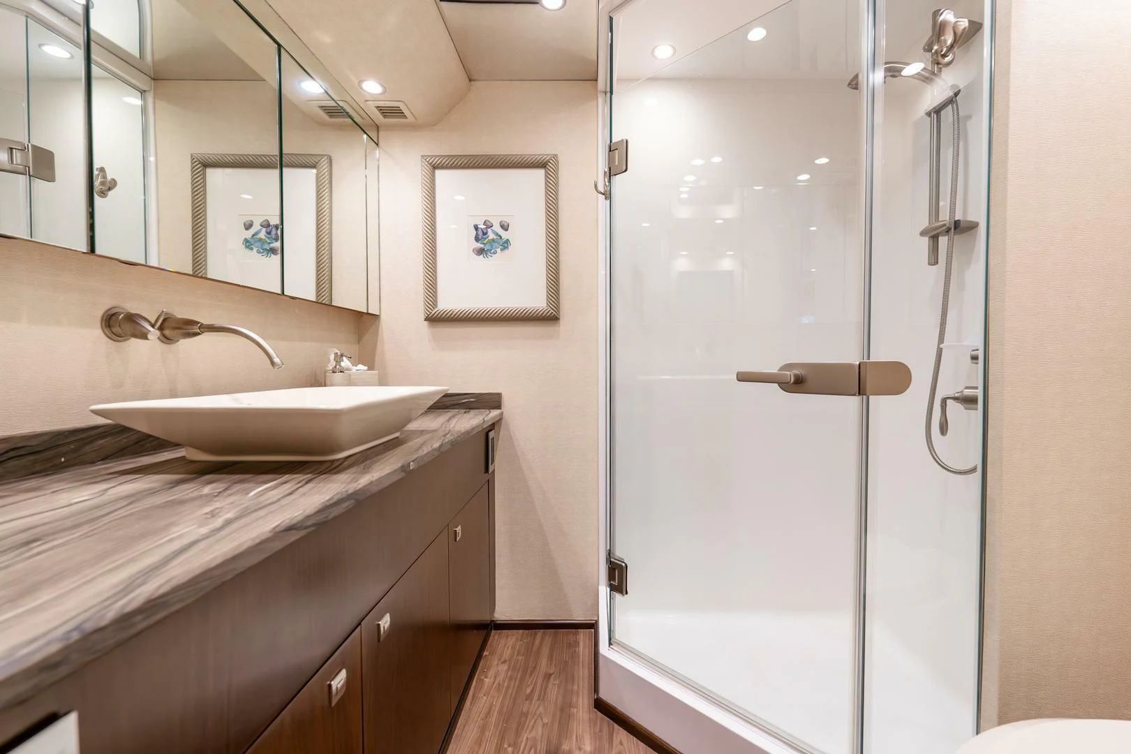 a bathroom with a sink and a mirror aboard THE PROVIDER Yacht for Sale