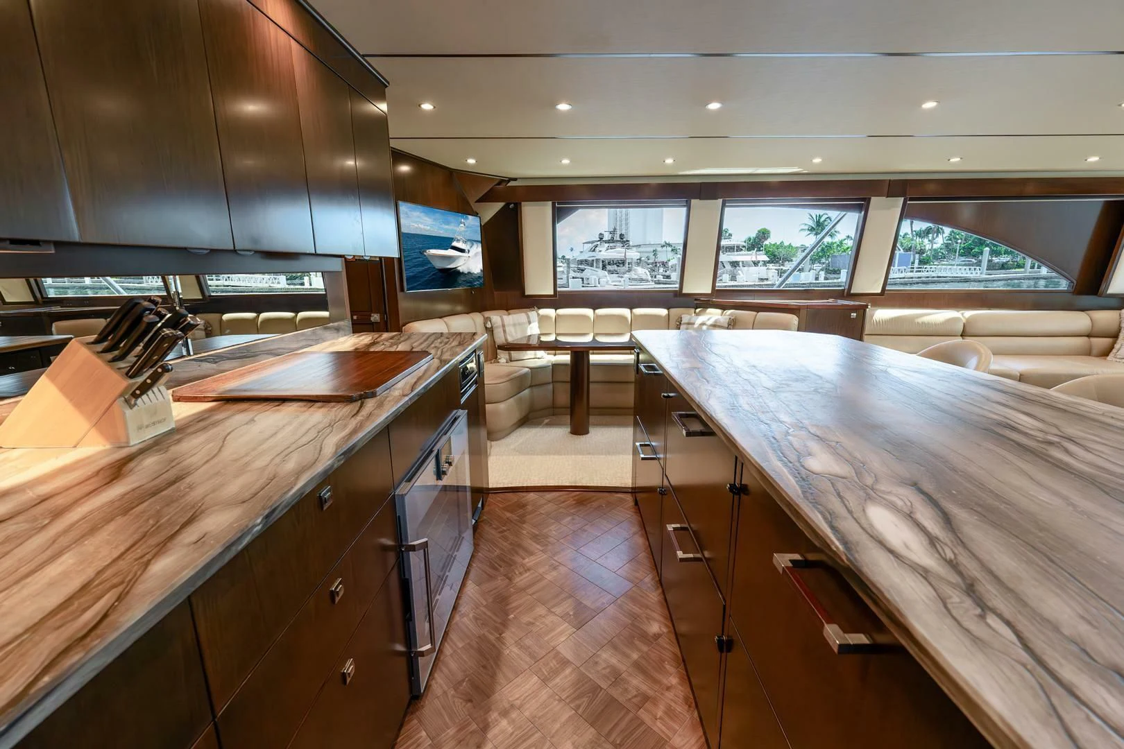 a room with wooden floors and a large window aboard THE PROVIDER Yacht for Sale